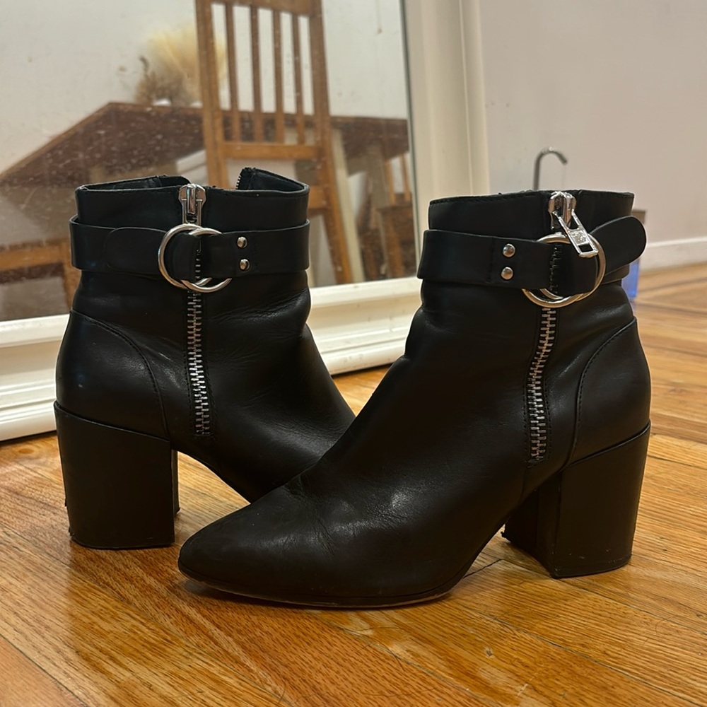 Steve Madden black boots with silver buckle